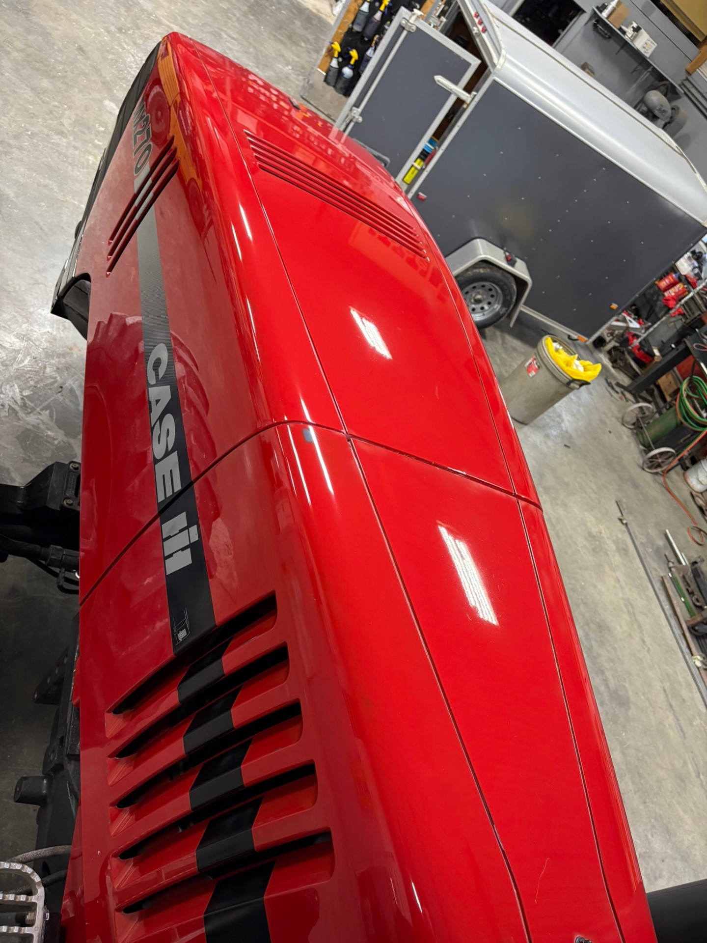 Case IH tractor with restored red paint and ceramic coating protection in Missouri